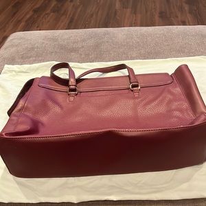 A New Day wine color bag.  NWOT